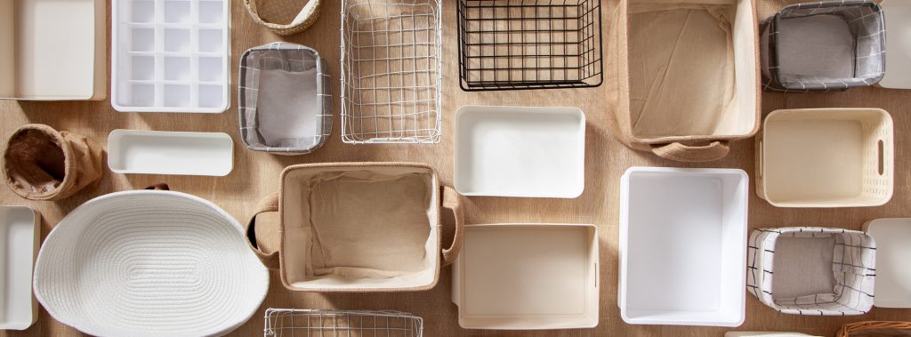 large group of different types of organizing bins