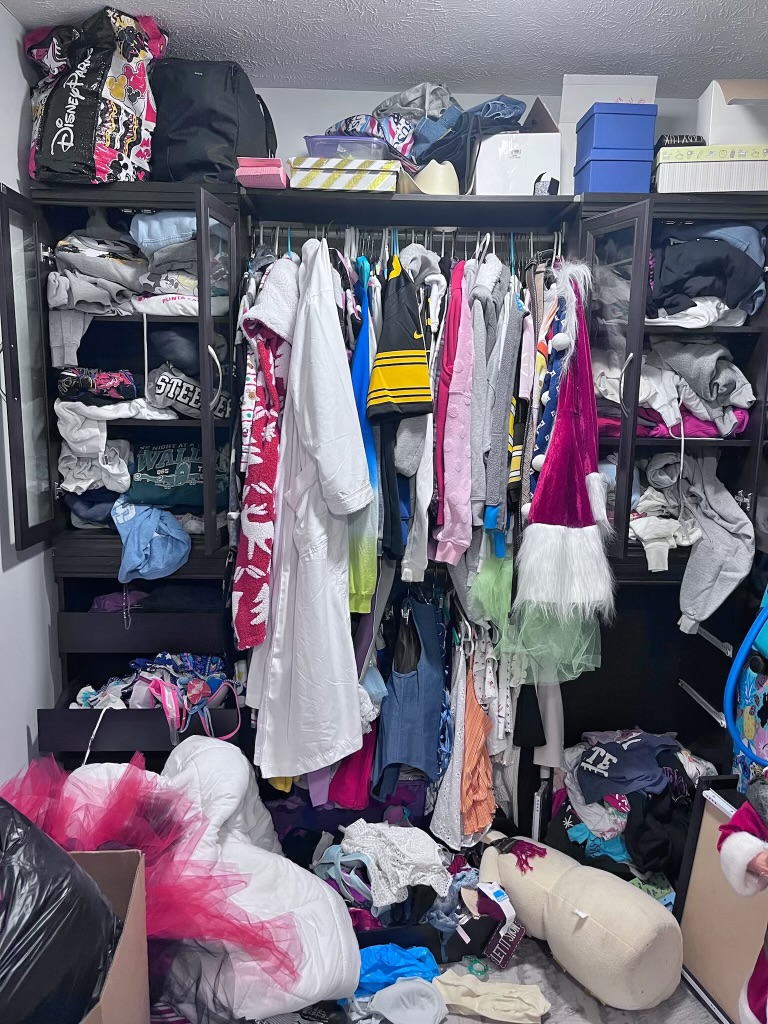 cluttered messy and disorganized closet shelves